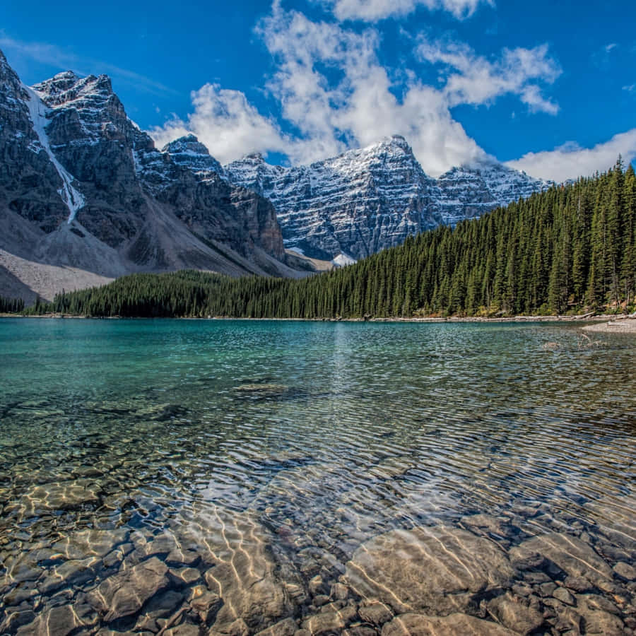 A Stunning Natural Landscape Illuminated By The Sun's Rays Wallpaper