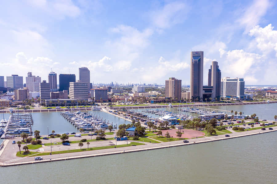 A Stunning View Of The Corpus Christi Bayfront Skyline Wallpaper