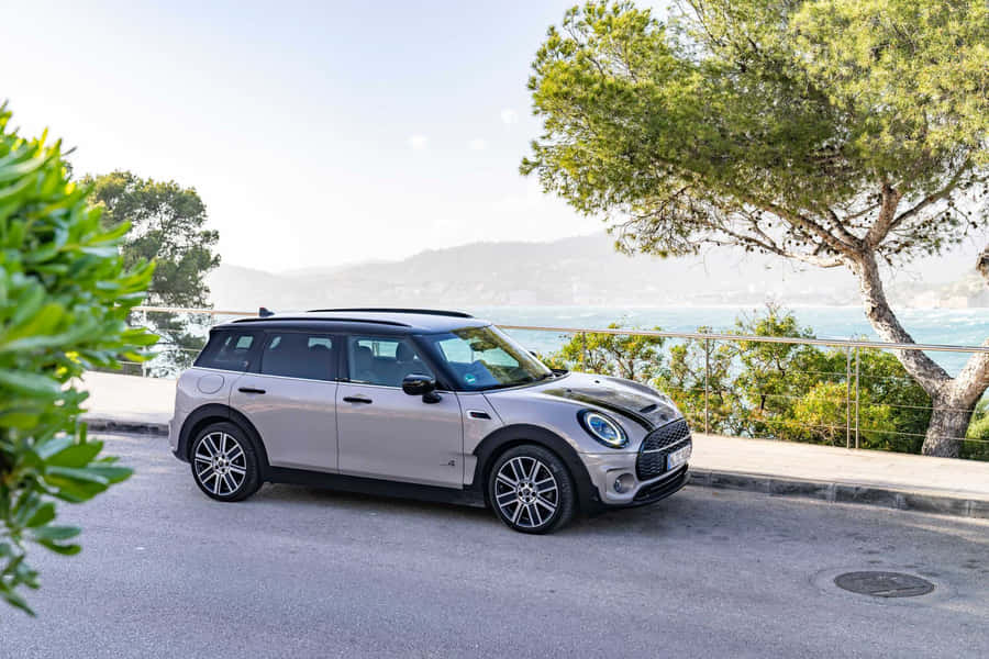 A Stylish Mini Cooper S Clubman All4 On Breathtaking Landscape Wallpaper