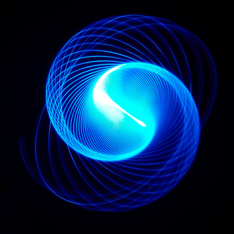 A Vibrant Electric Blue Gradient Against A Textured Backdrop Wallpaper