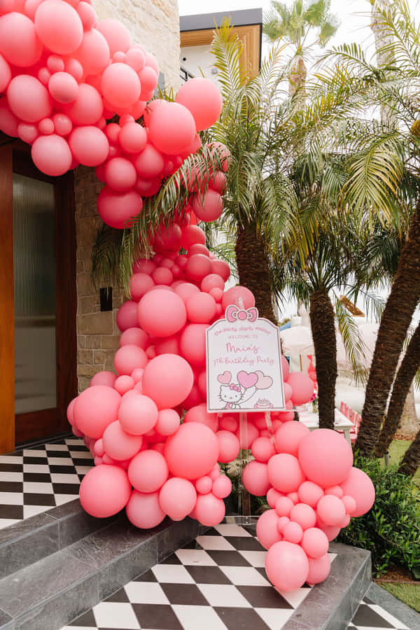 A Vibrant Hello Kitty Themed Party Celebration Wallpaper