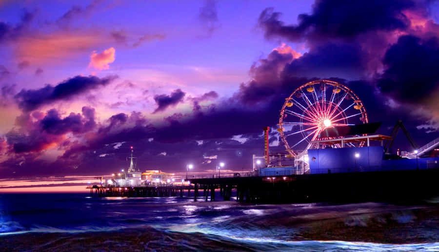 A Vibrant Purple Laptop With A True Hd Display Wallpaper