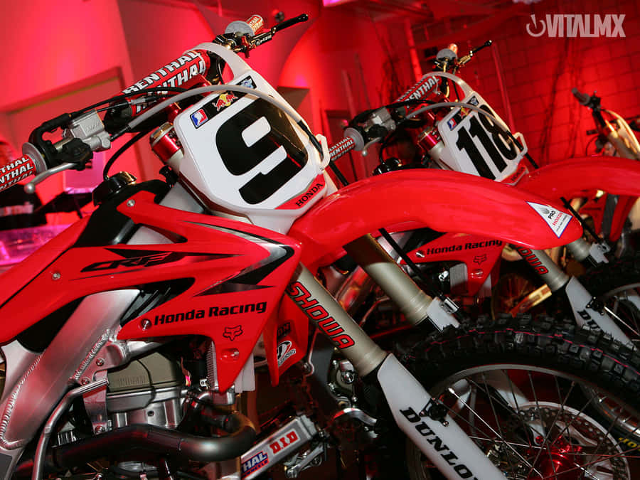A Vibrant Red Vitalmax Motorcycle Wallpaper