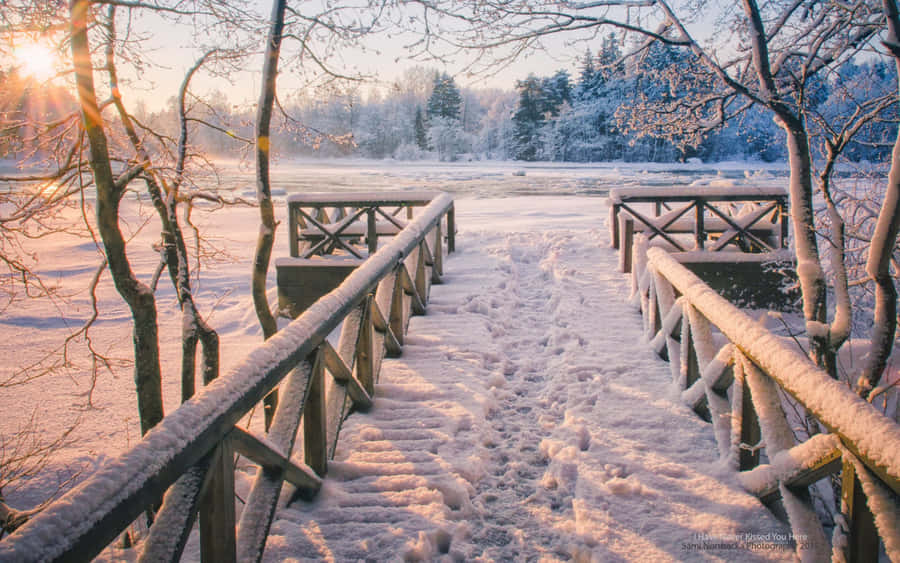 A View Of A Picturesque Winter Wonderland. Wallpaper