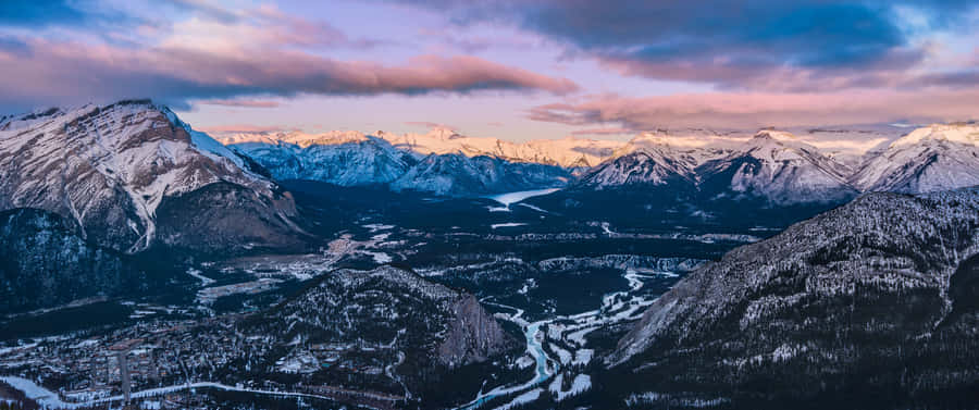 A View Of The Mountains From An Airplane Wallpaper