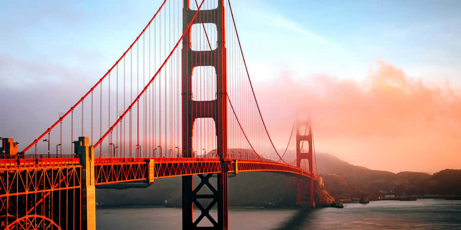 A View Of Wonders - A Majestic Mountain Range Wallpaper