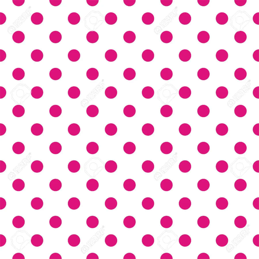 A Vivid And Cheerful Pattern Of Pink And White Polka Dots Wallpaper