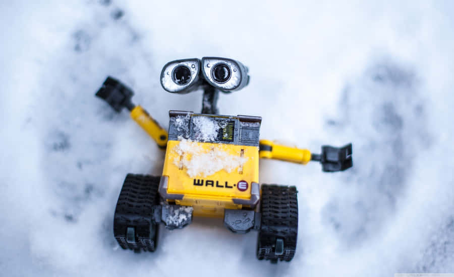 A Woman Creating A Snow Angel In A Winter Wonderland Wallpaper