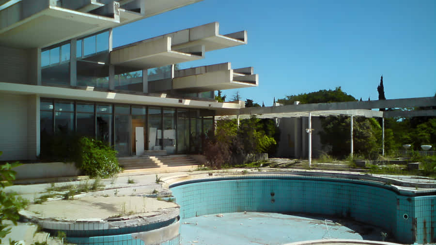 Abandoned Pool And Building Wallpaper