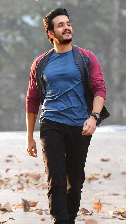 Actor Akhil Akkineni Enjoying A Peaceful Afternoon Walk. Wallpaper