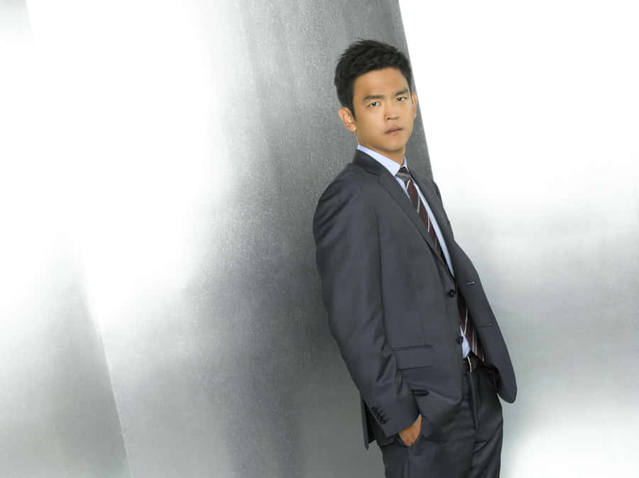 Actor John Cho Striking A Pose Wallpaper