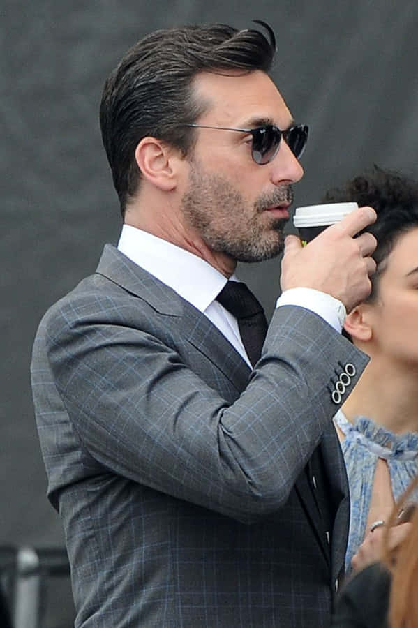 Actor Jon Hamm In A Dress Shirt And Glasse Wallpaper