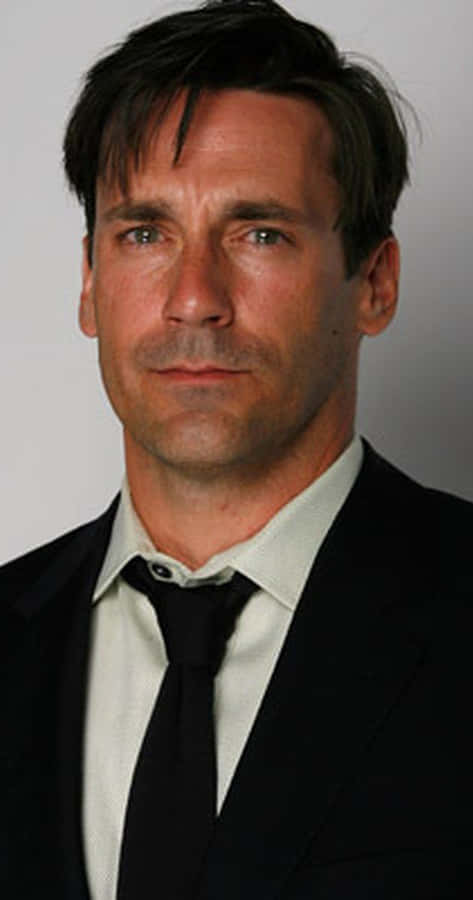 Actor Jon Hamm In A Modern Portrait. Wallpaper