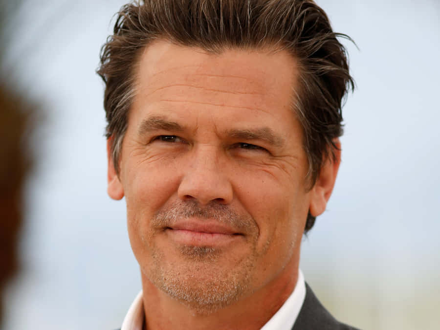 Actor Josh Brolin Striking A Dramatic Pose Wallpaper