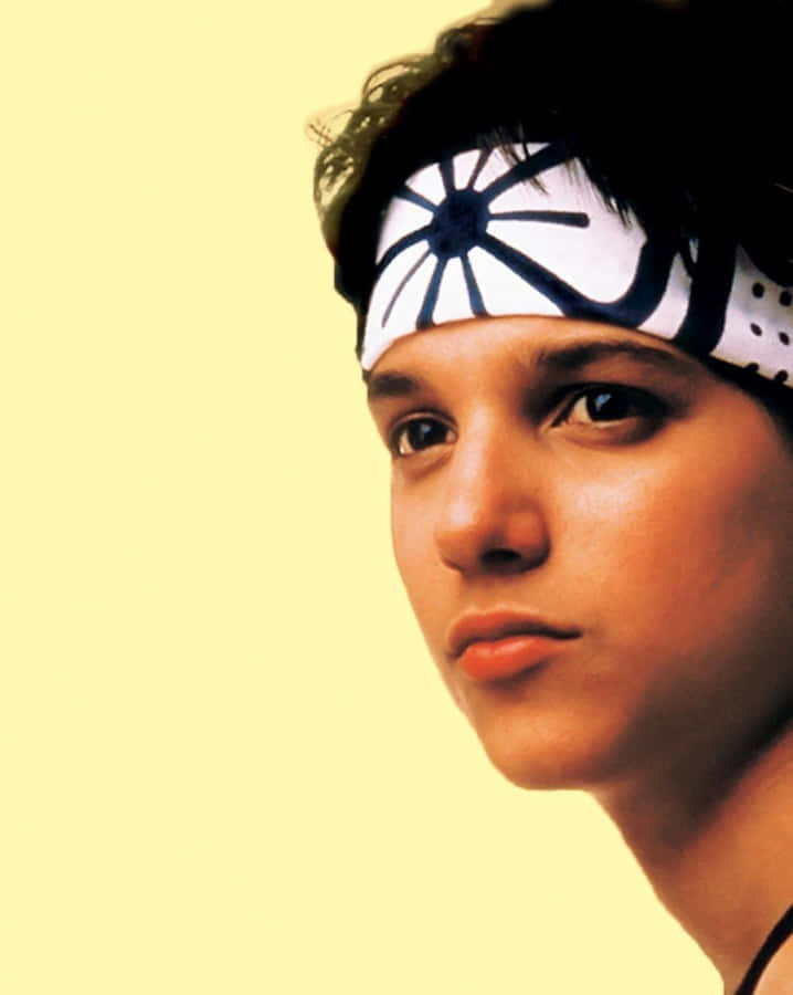 Actor Ralph Macchio Showcasing His Infamous Karate Kid Crane Kick.