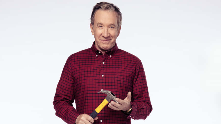 Actor Tim Allen Strikes A Charming Pose Wallpaper