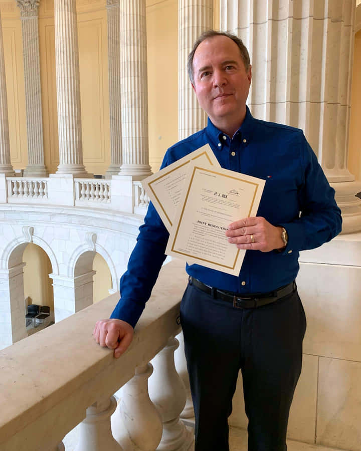 Adam Schiff Holding His Certificates Wallpaper
