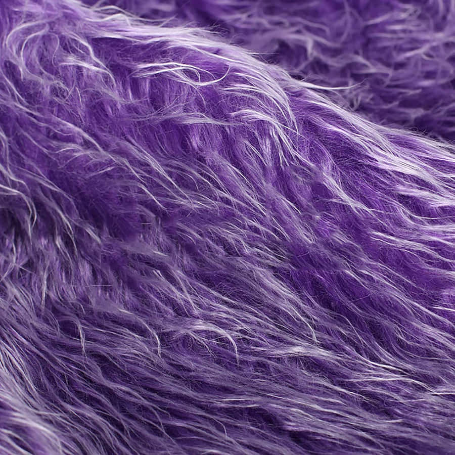 Add A Touch Of Luxury To Any Space With This Plush And Stylish Purple Faux Fur Wallpaper