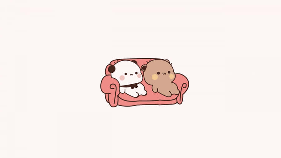 Adorable_ Animated_ Characters_ On_ Sofa Wallpaper