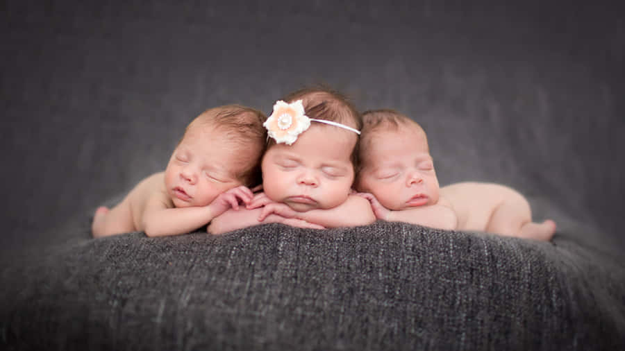 Adorable Baby Wearing White Knitted Hat Wallpaper