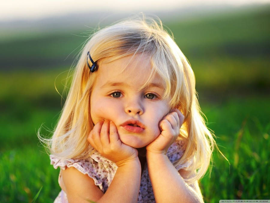 Adorable Blonde Baby Girl Wallpaper