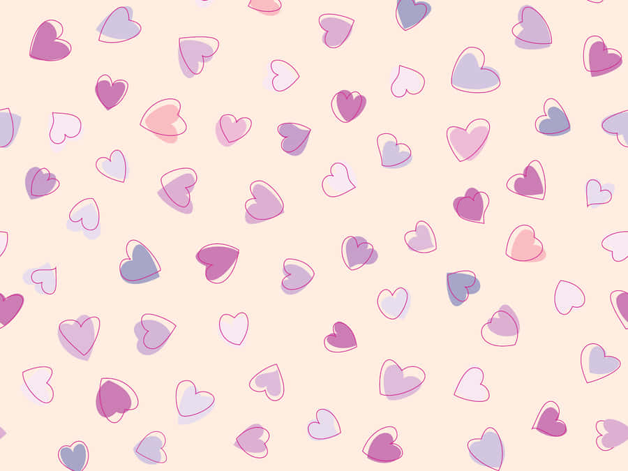 Adorable Collection Of Pink And Purple Hearts Floating Together Wallpaper