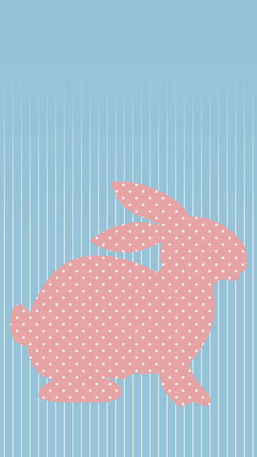 Adorable Pink Bunny Hopping Through A Grassy Meadow Wallpaper