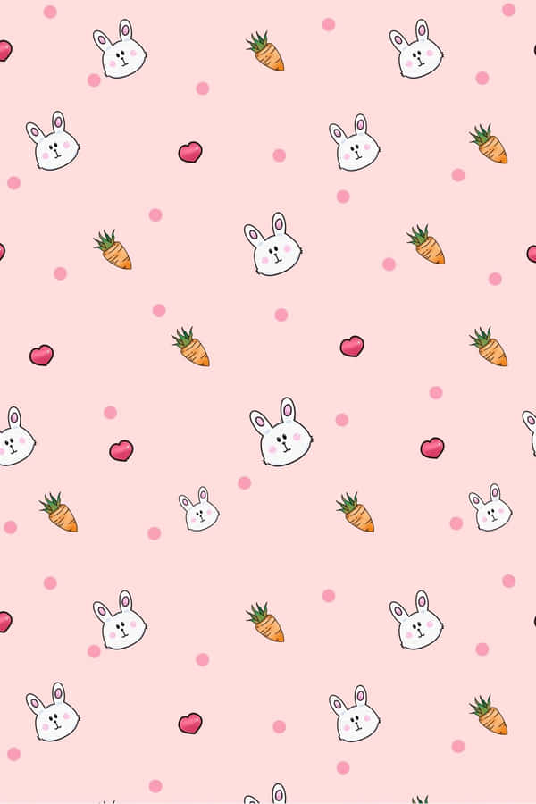 Adorable Pink Bunny On A Fresh Clover Field Wallpaper