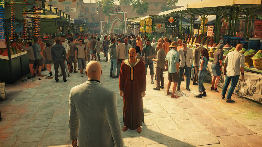 Agent 47 Poised In Bold Stance In An Exotic Tropical Setting Of Hitman 2. Wallpaper