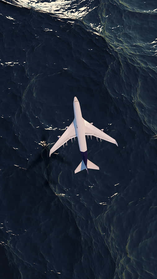 Aircraft_ Over_ Ocean_ View_from_ Above Wallpaper