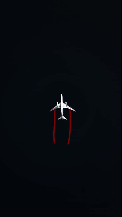 Airplane Overhead Viewwith Red Contrails Wallpaper