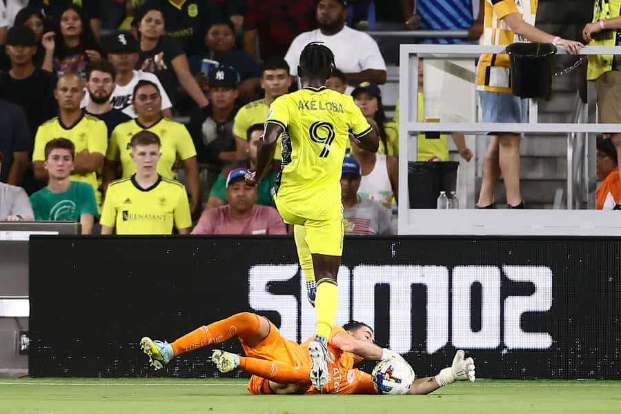 Ake Loba Evading Goalkeeper Challenge Wallpaper