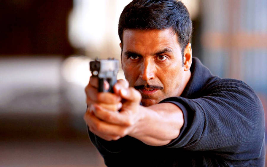 Akshay Kumar Pointing Gun Wallpaper
