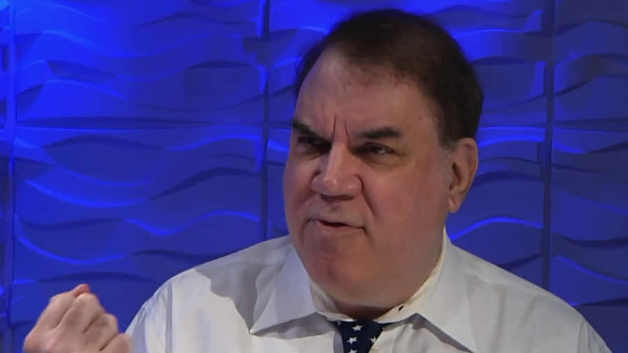 Alan Grayson Against Purple Backdrop Wallpaper