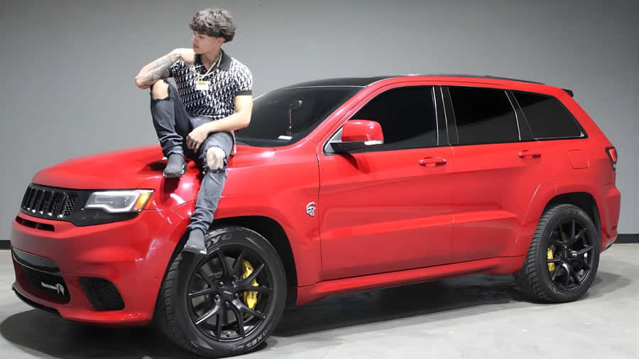 Alex Chino With Red Jeep Wallpaper