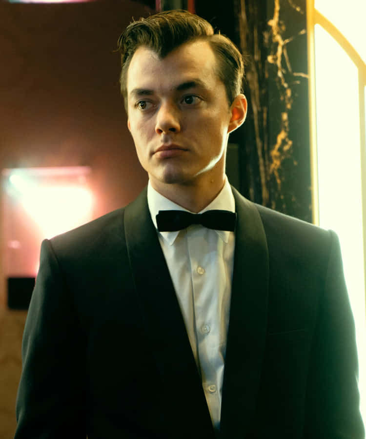 Alfred Pennyworth, The Loyal Butler And Confidant Of Batman Wallpaper