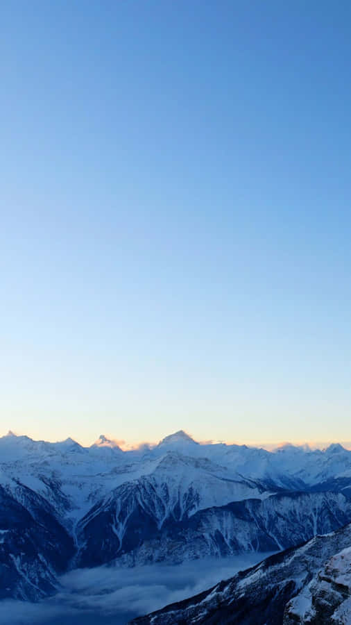 Alpine_ Glow_at_ Dusk Wallpaper