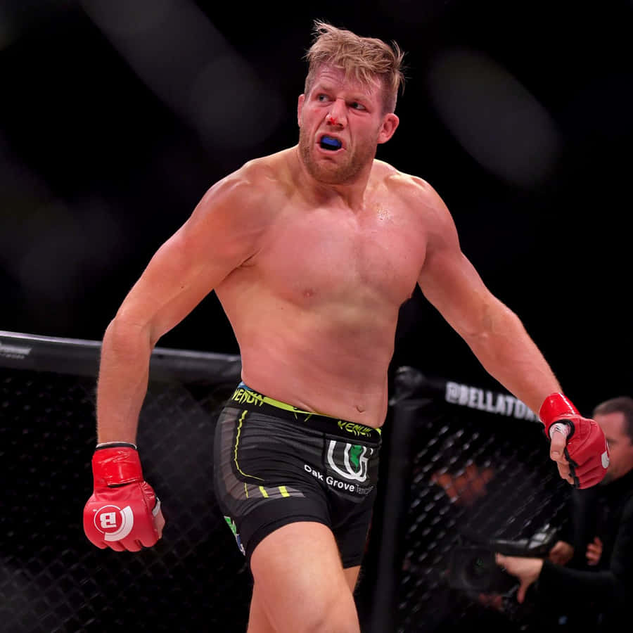 American Mixed Martial Artist Jake Hager In Bellator Cage Wallpaper