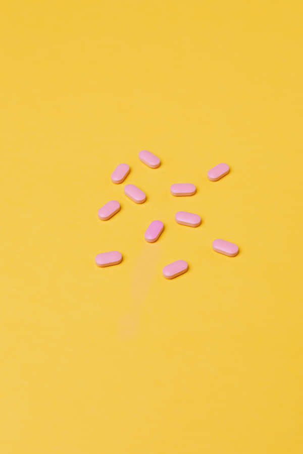 An Artistic Blend Of Pastel Pink And Yellow. Wallpaper