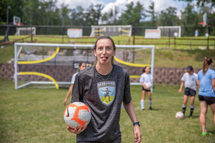 Andi Sullivan: Dominating The Football Field Wallpaper