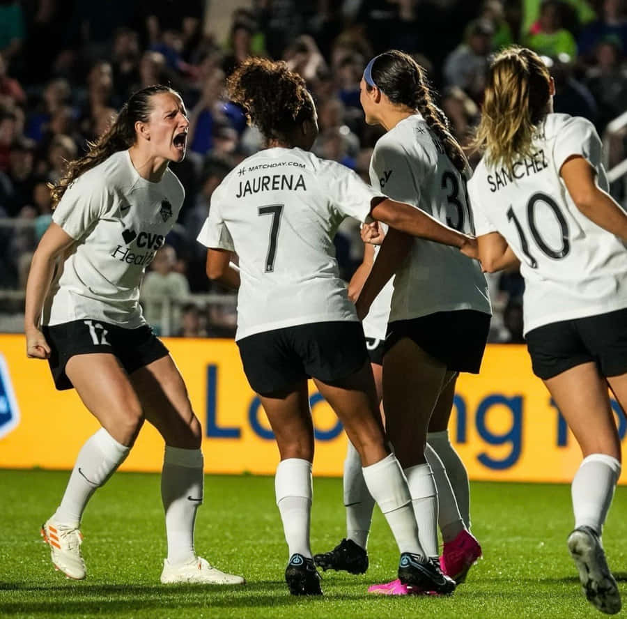 Andi Sullivan In Action - The Game-changing Football Star Wallpaper