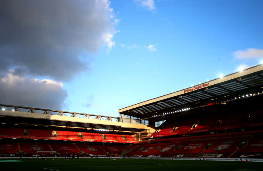Anfield Stadium Sunset Glow Wallpaper