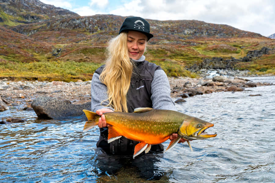 Anglerwith Arctic Char Wallpaper