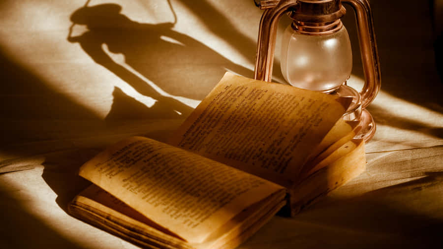 Antique Book And Lantern Wallpaper