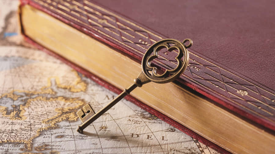 Antique Skeleton Key And Book Wallpaper