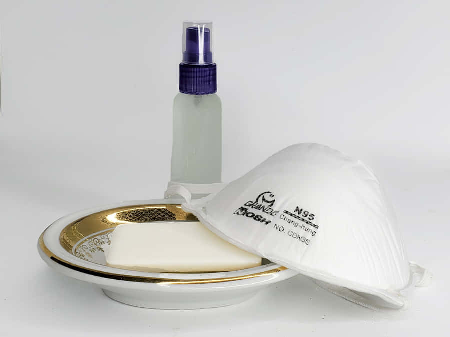 Antiseptic Products And A Mask Wallpaper