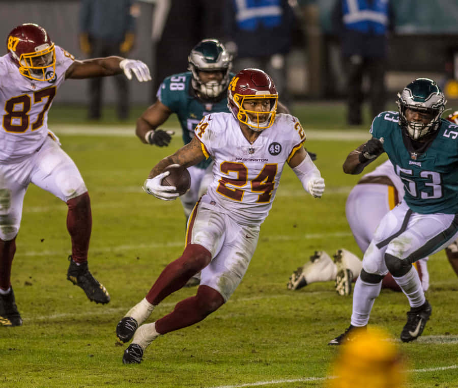 Antonio Gibson Evasive Run N F L Game Wallpaper