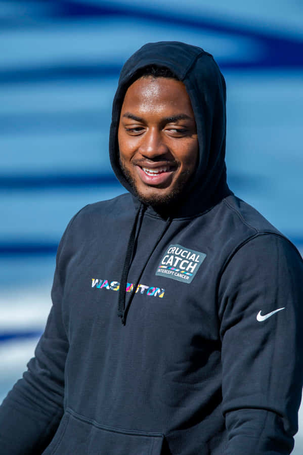 Antonio Gibson Smilingin Hoodie Wallpaper