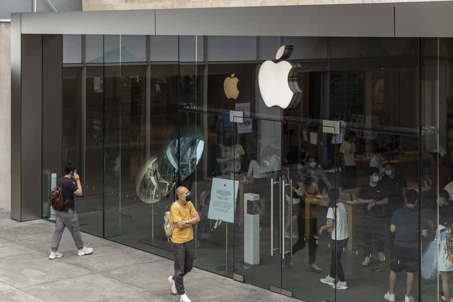 Apple Store Exteriorwith Customers Wallpaper