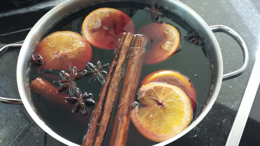 Aromatic And Heartwarming Mulled Wine With Spices Wallpaper
